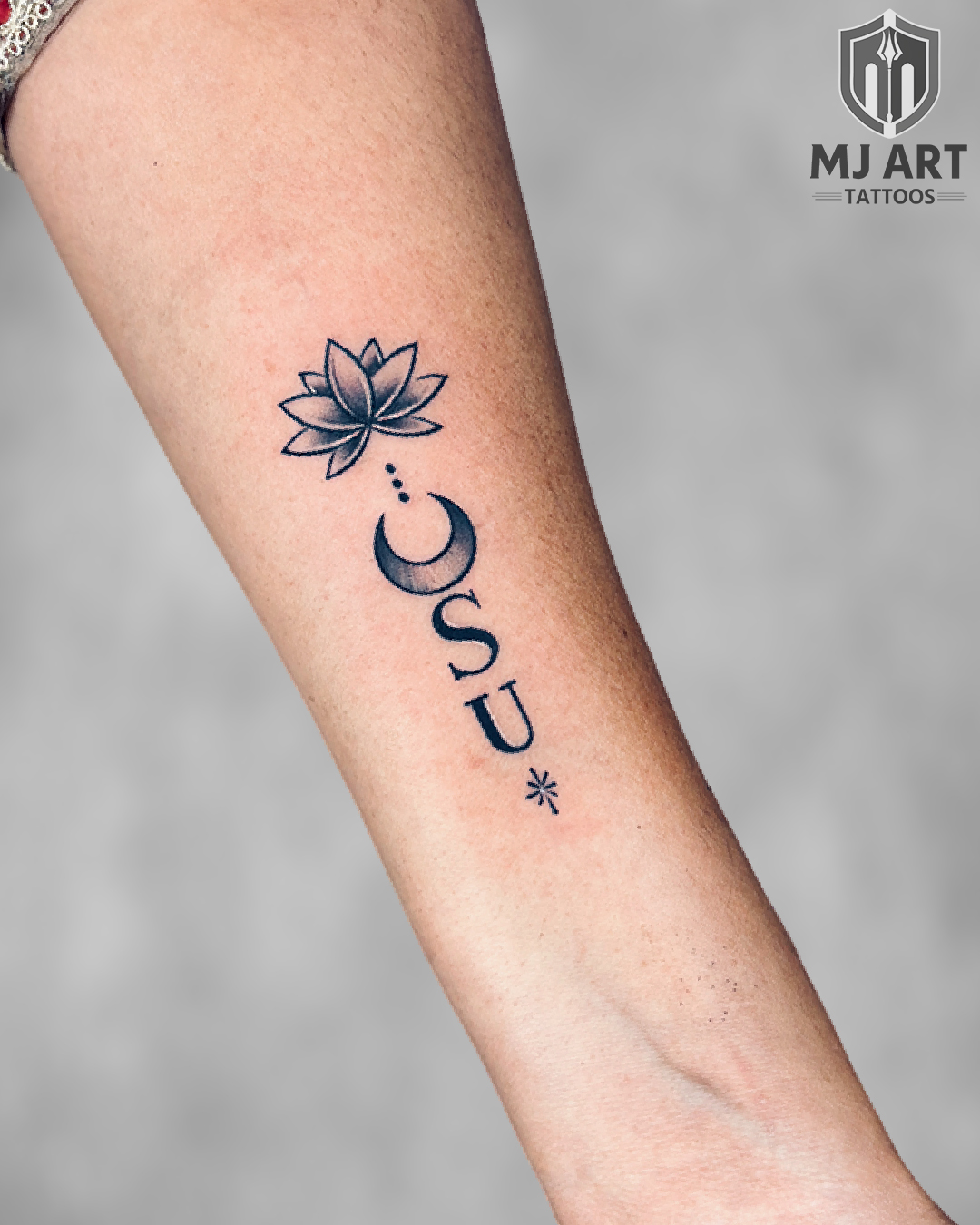 Lotus Moon Initials SU Forearm Tattoo