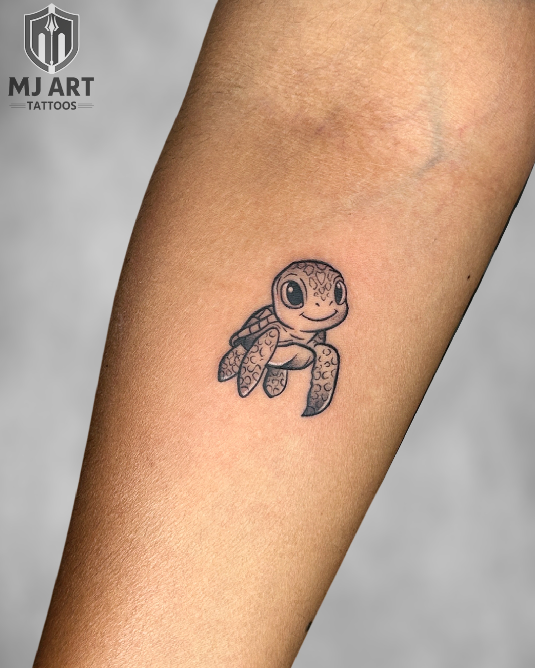 Baby Turtle Forearm Tattoo