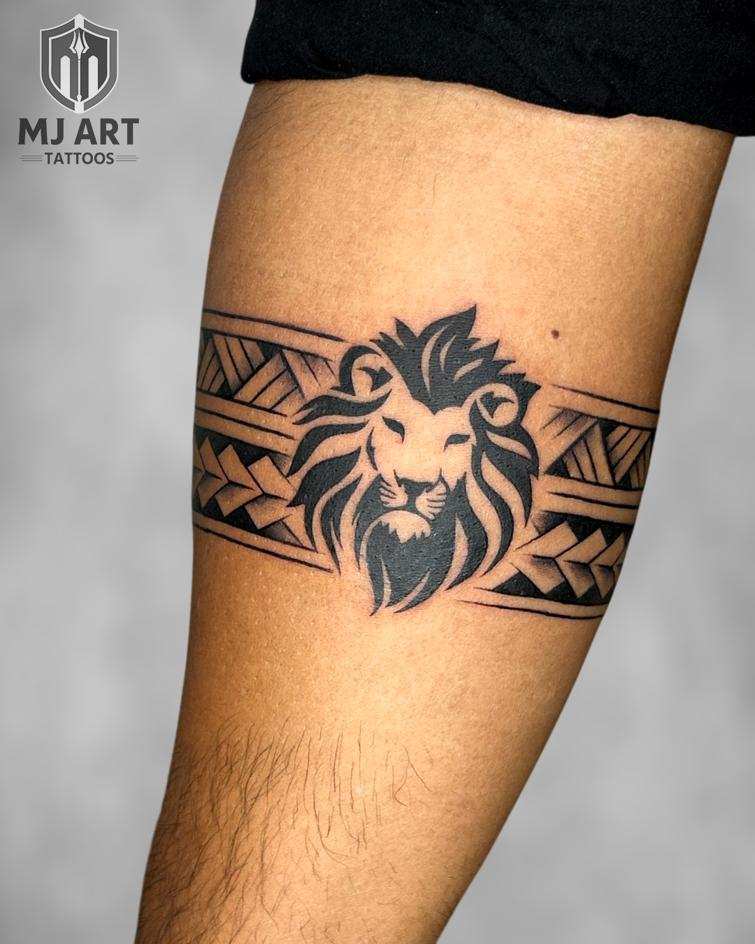 Lion Tribal Band Tattoo