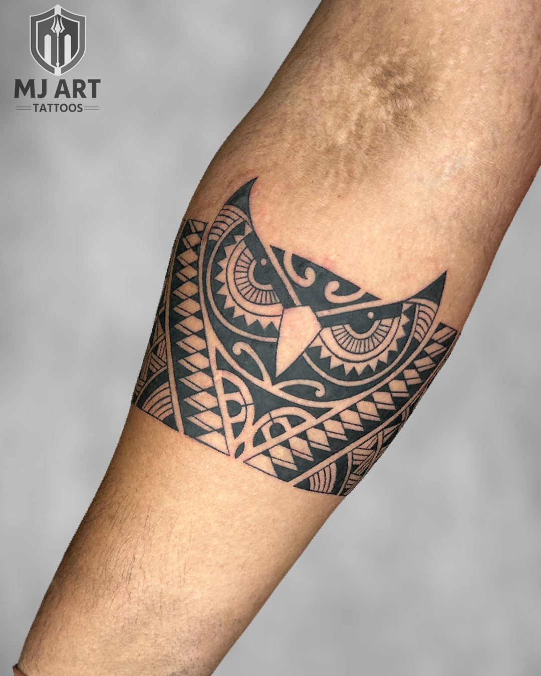 Polynesian Owl Band Tattoo