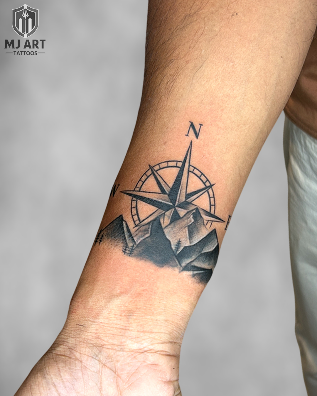 Cover Up Mountain Compass Wrist Tattoo