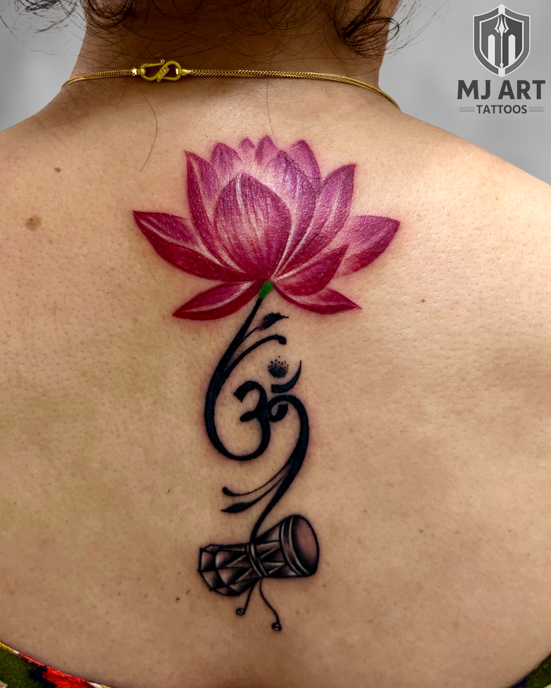 Lotus Om Damru Back Tattoo
