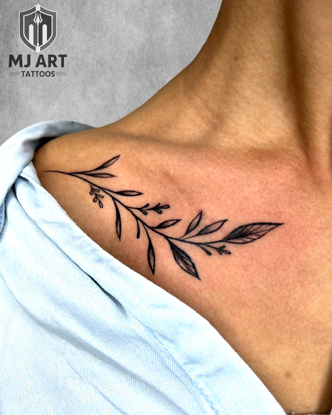 Botanical Leaf Fine Line Collarbone Tattoo