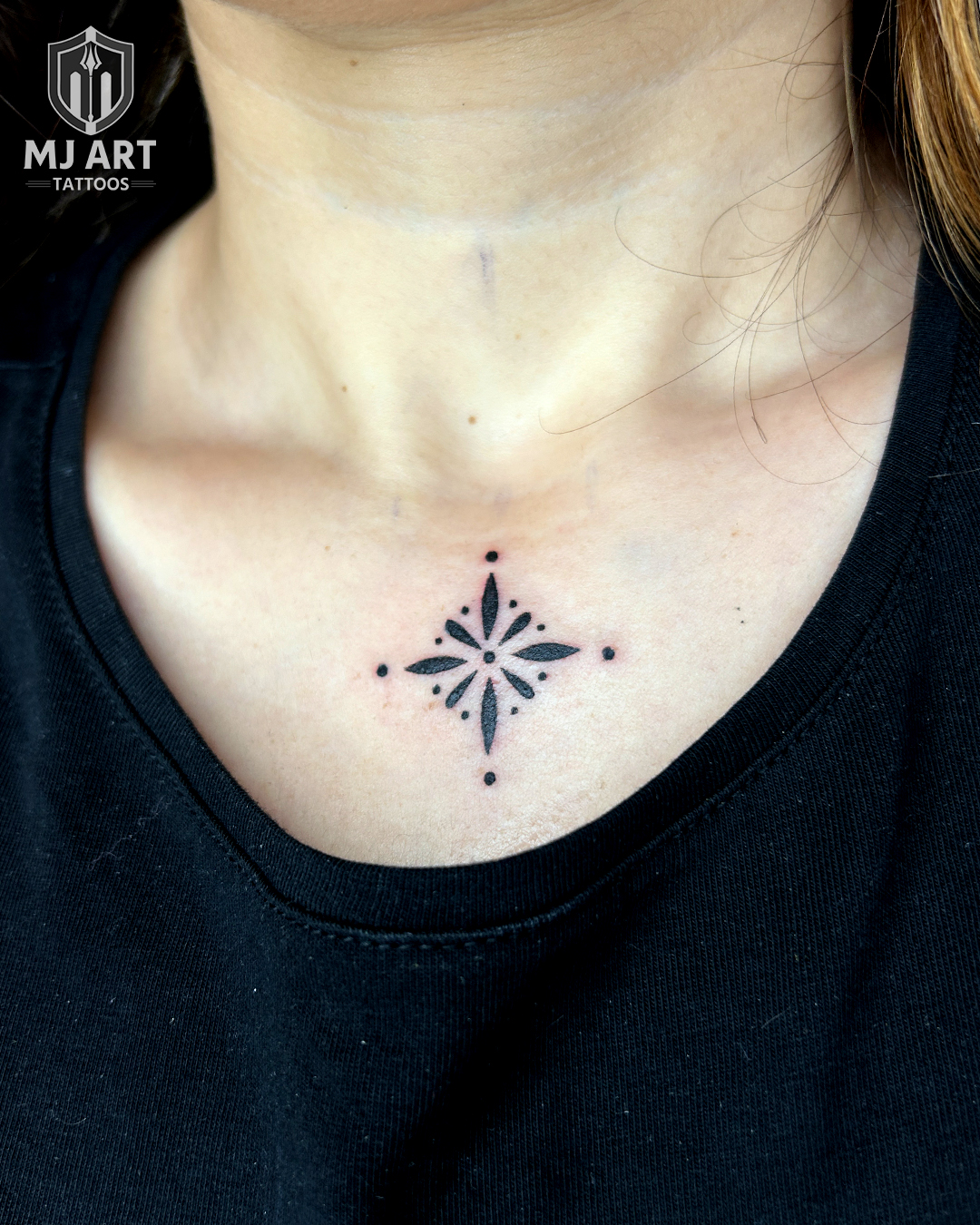 Mandala Star Fine Line Chest Tattoo