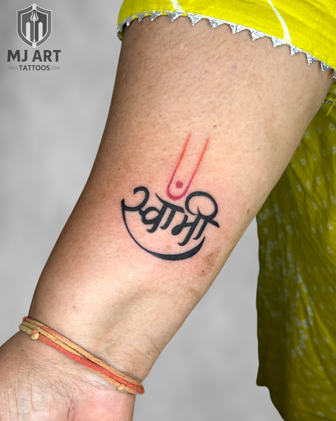 Swami Hindi Script Wrist Tattoo