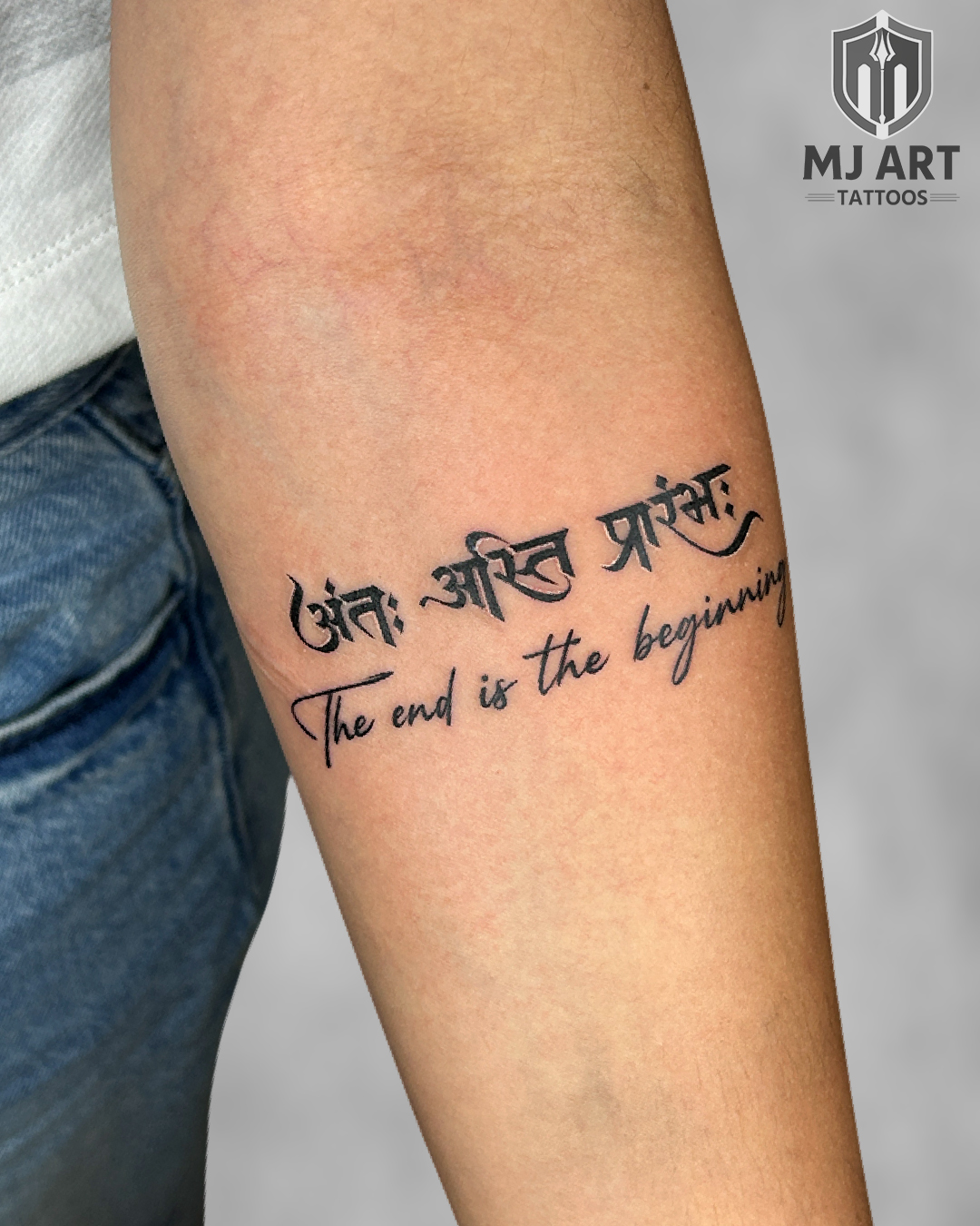 Sanskrit Mantra End Is Beginning Forearm Tattoo
