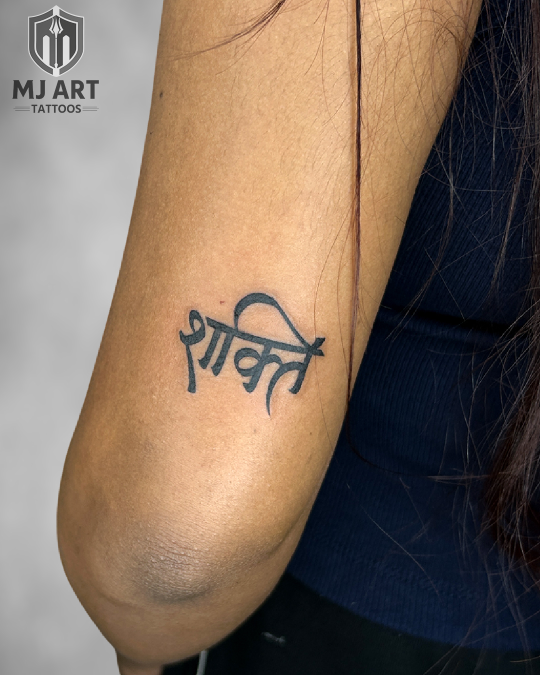 Shakti Hindi Script Forearm Tattoo