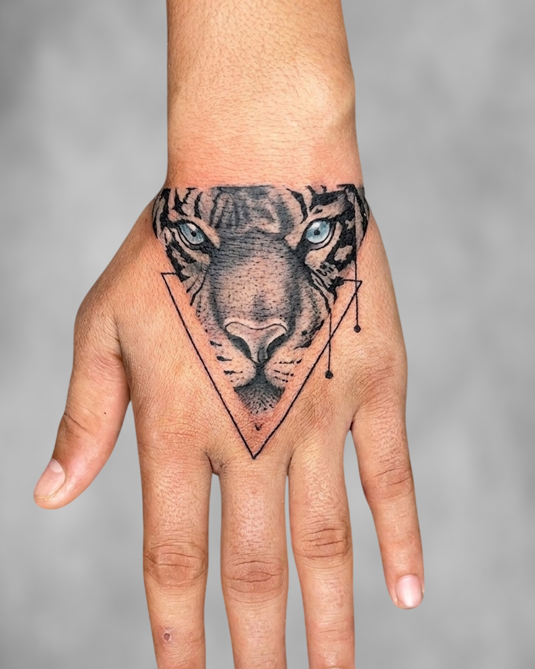 Tiger Blue Eyes Geometric Hand Tattoo