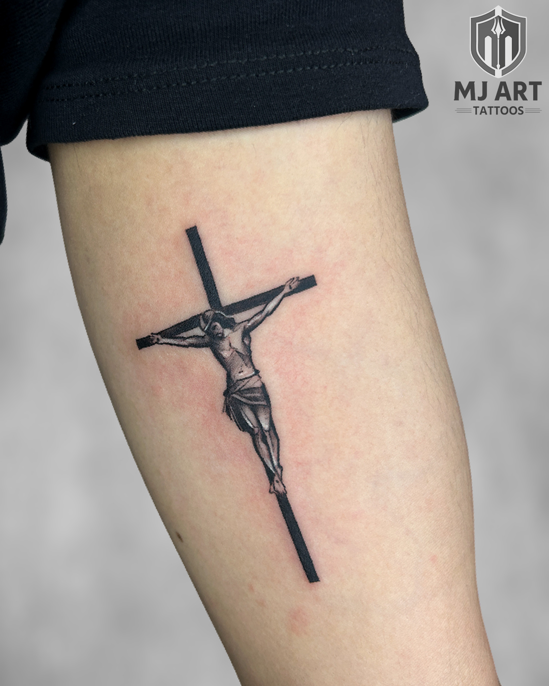 Jesus Christ Cross Forearm Tattoo