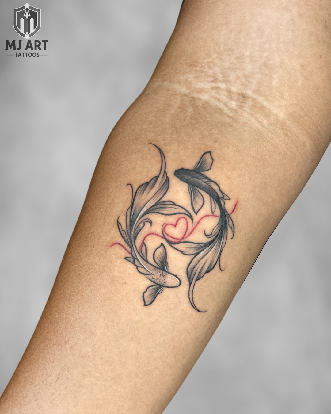 Pisces Koi Fish Heart Forearm Tattoo