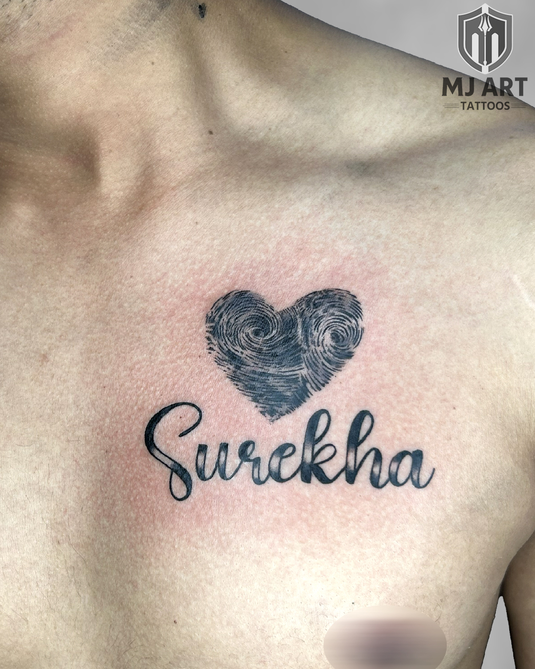 Fingerprint Heart Name Chest Tattoo
