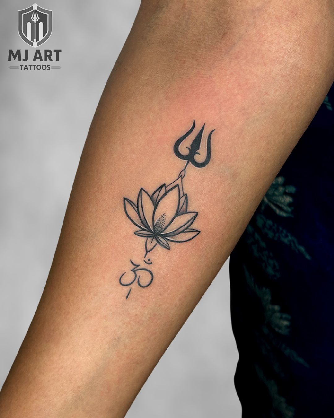 Trishul Lotus Om Forearm Tattoo