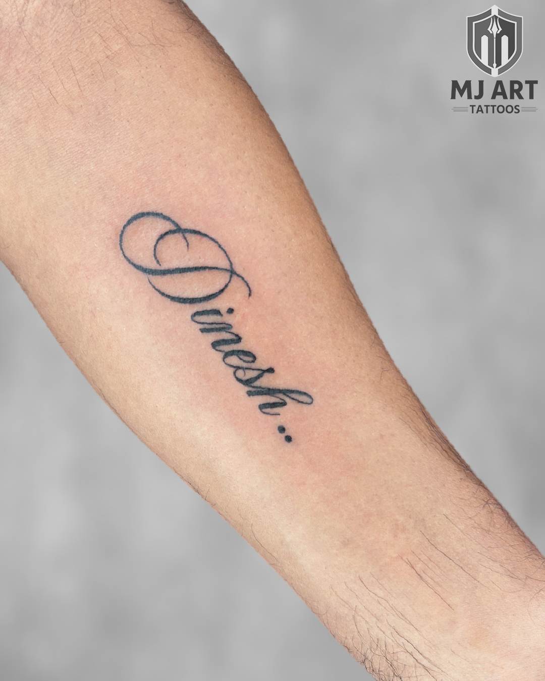 Dinesh Calligraphy Script Tattoo