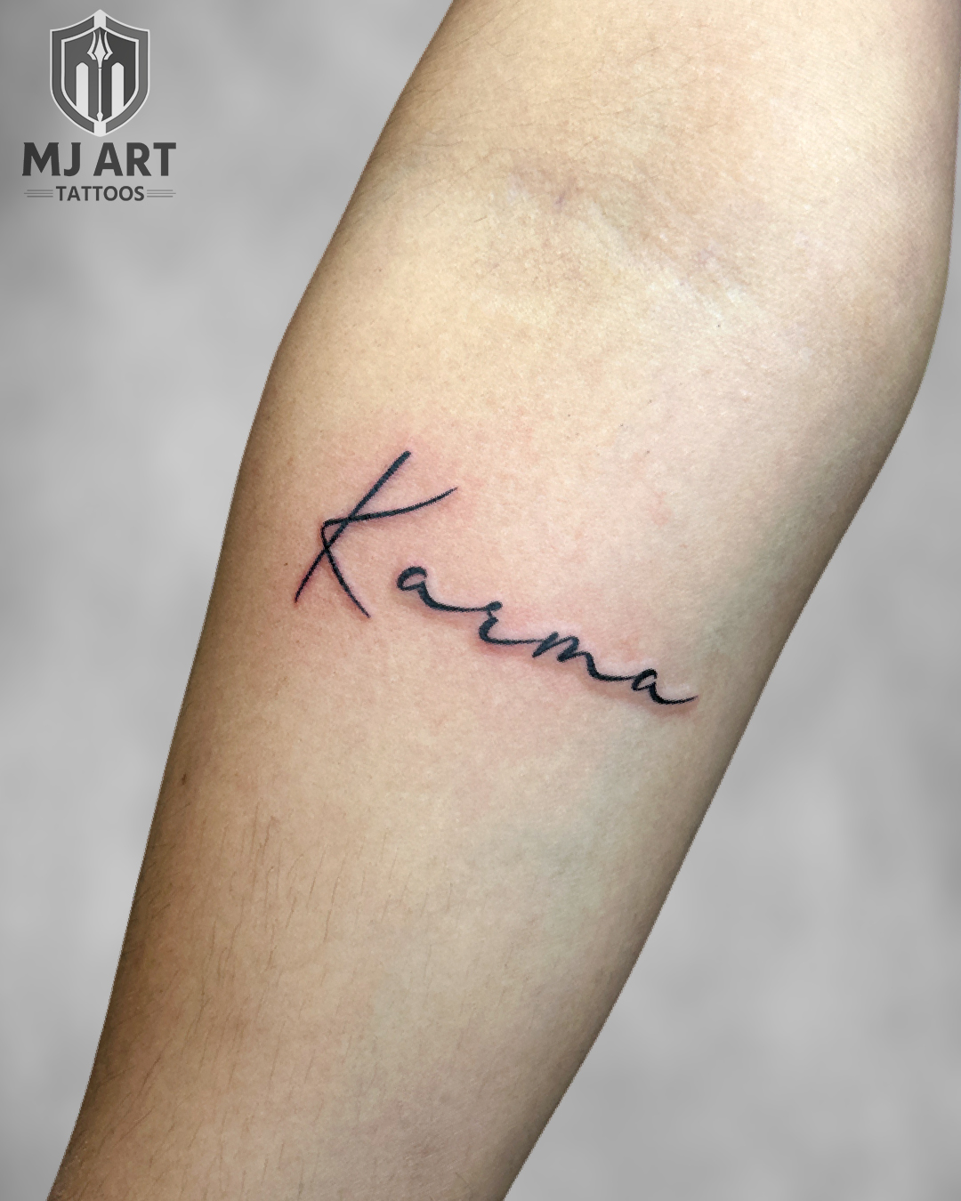 Karma Fine Line Script Tattoo