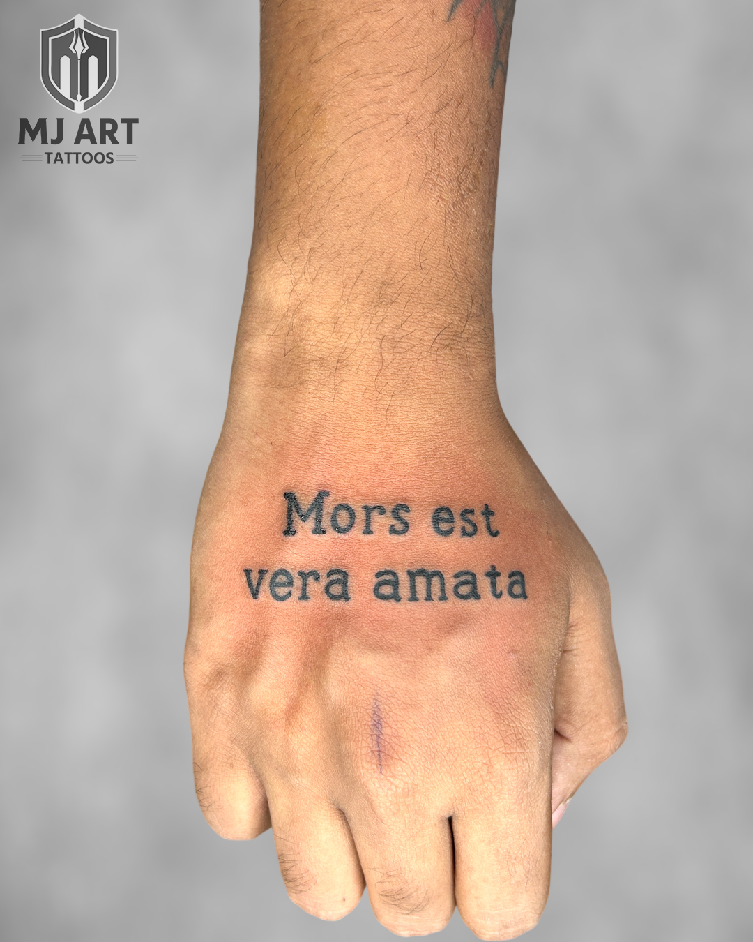 Mors Est Vera Amata Hand Tattoo
