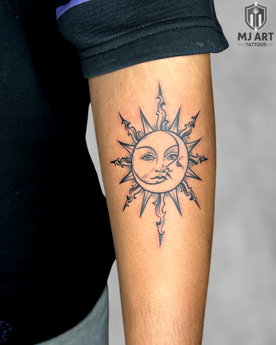 Sun Moon Face Celestial Forearm Tattoo